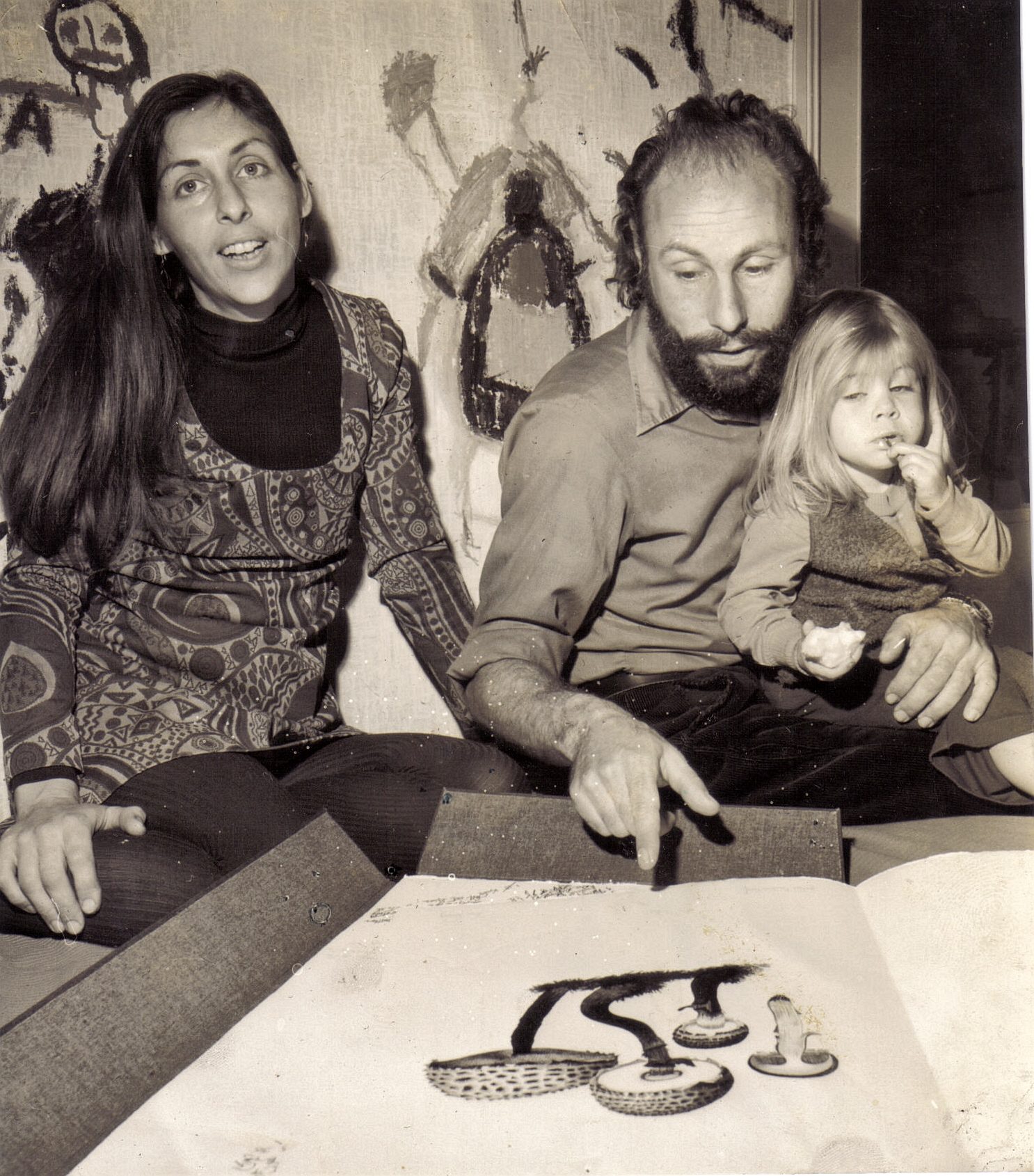 Fred with wife Rina and daughter Lois looking at the John Cage and Lois Long Mushroom book