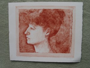 Portrait of womens profile (light toned border red)